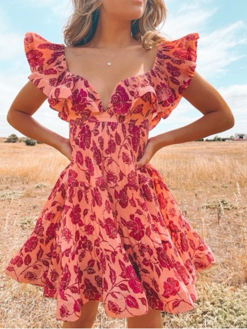 Zimmermann The Lovestruck Ruffled Floral-Print Plissé-Crepe Mini Dress.